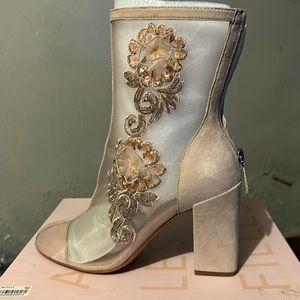 Women’s peach stylist heel booties, fits comfortably stylish with jeans.